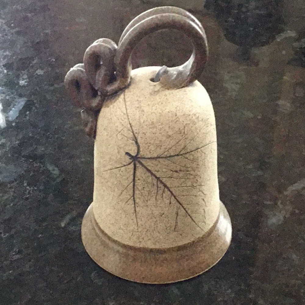 Pottery crafted‎ bell